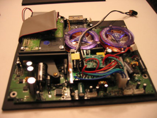 Illustration for article titled Xbox Mini Case Mod is Nothing Shy of Modding Genius
